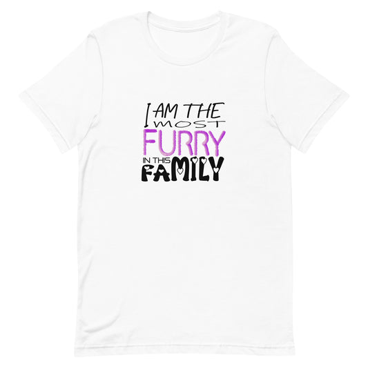 White cotton crew neck unisex  short sleeve tshirt, on the apparel is a graphic text saying " i am the most furry in this family" the text "furry" is with fluffy pink graphic. and the text "family" got small hearts in each of the letters.