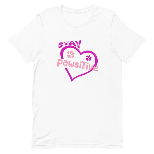 White cotton crew neck unisex  short sleeve tshirt, on the apparel is a graphic purple inside is two paws, one in pink, and another in purple above the heart is the text "stay" in purple color, and across the heart is the text "pawsitive" in pink color.