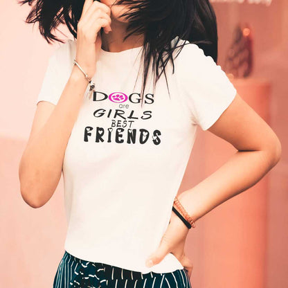 White cotton crew neck unisex  short sleeve tshirt, on the apparel is a graphic black text  saying "dogs are girls best friends"  the letter O in "dogs" is a purple paw