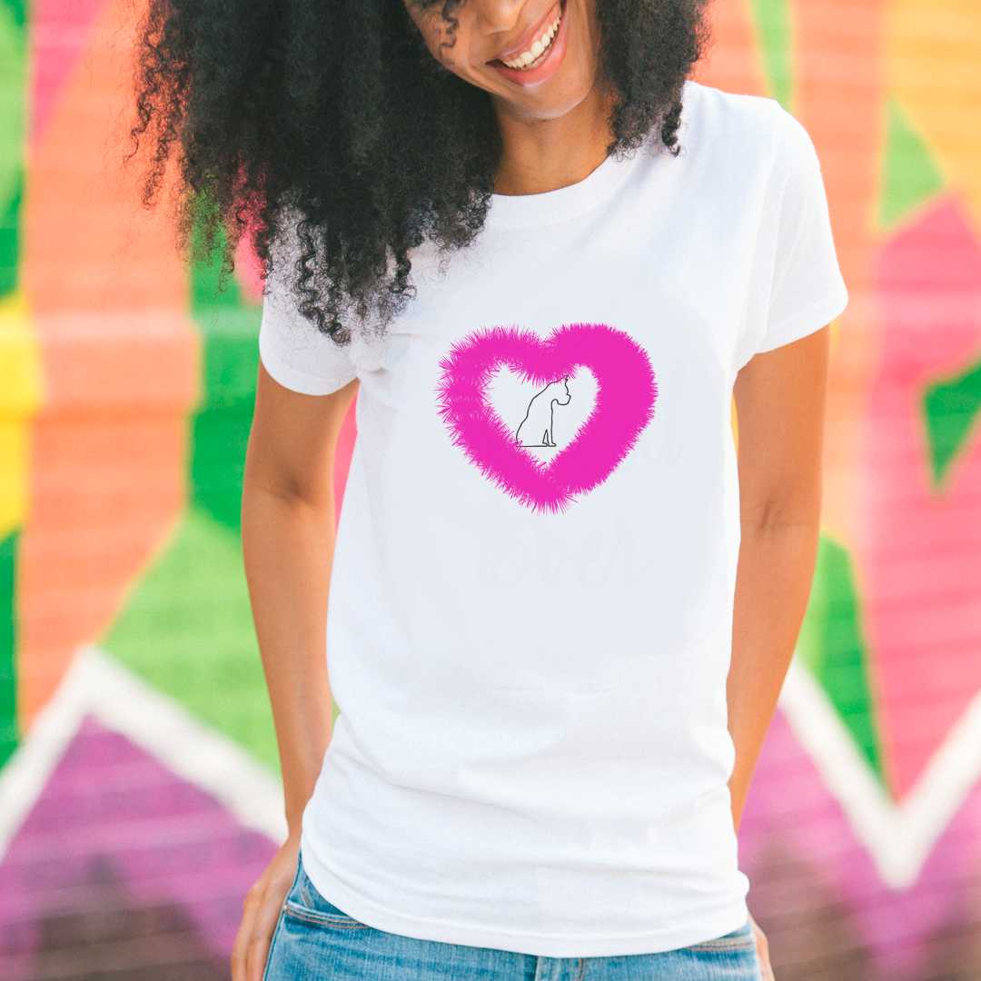 White cotton crew neck unisex  short sleeve tshirt, on the apparel is a graphic pink fluffy heart shape with a dog in black color sitting inside